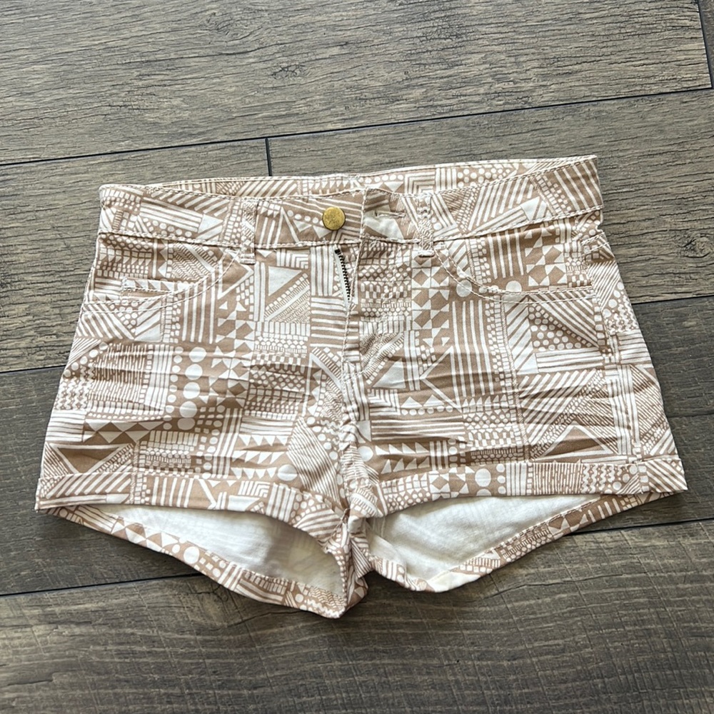 Beige and white Aztec tribal print shorts